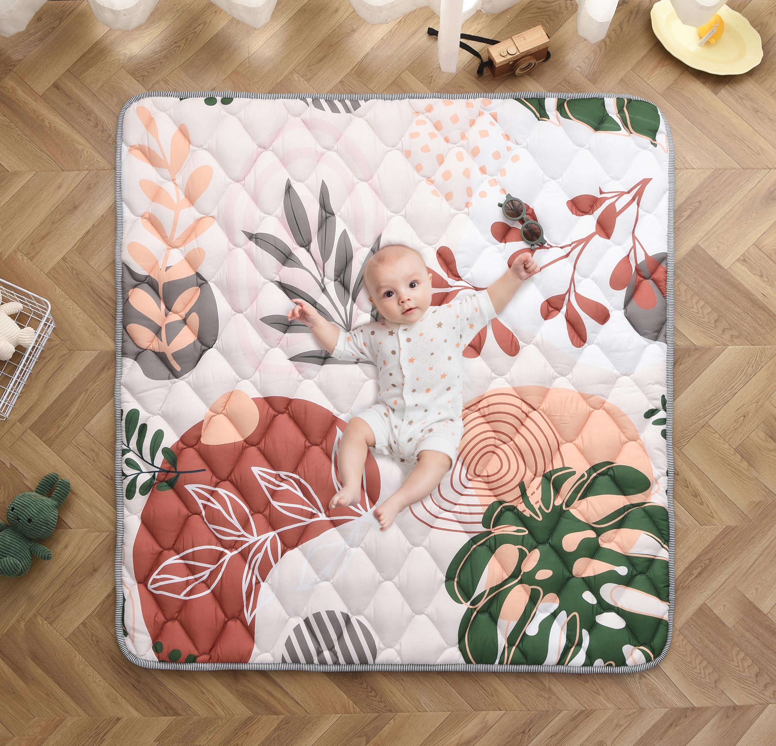 TADO MUSLIN bohemian 50x50 play mat with cozy cushioning for tummy time.