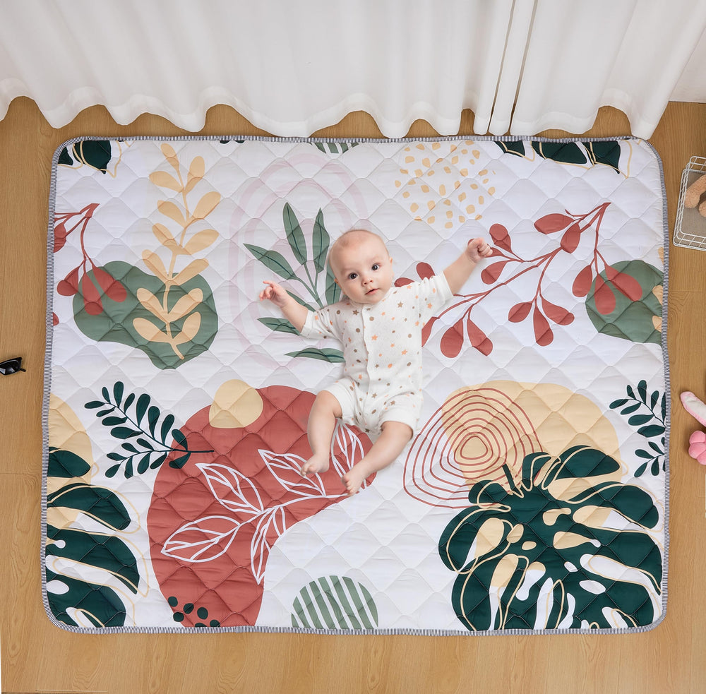 TADO MUSLIN baby play mat in bohemian pattern with plush cushioning for tummy time.