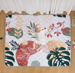 TADO MUSLIN baby play mat in bohemian pattern with plush cushioning for tummy time.