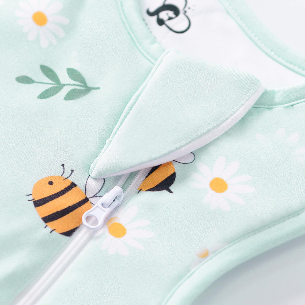 TADO MUSLIN fabric close-up reveals soft, breathable material quality.