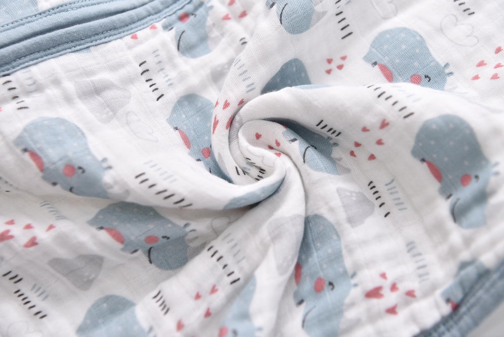 TADO MUSLIN size chart shows growing baby size options.