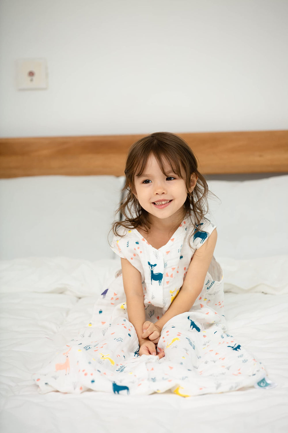 TADO MUSLIN sleep sack side view showing deer print and breathable fabric