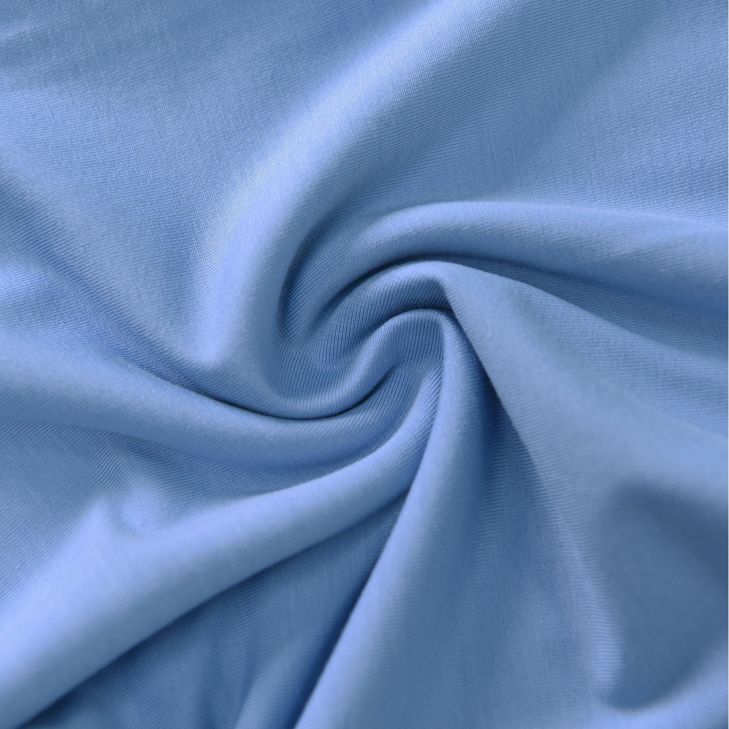 TADO MUSLIN toddler sleeping snugly in blue sleep sack