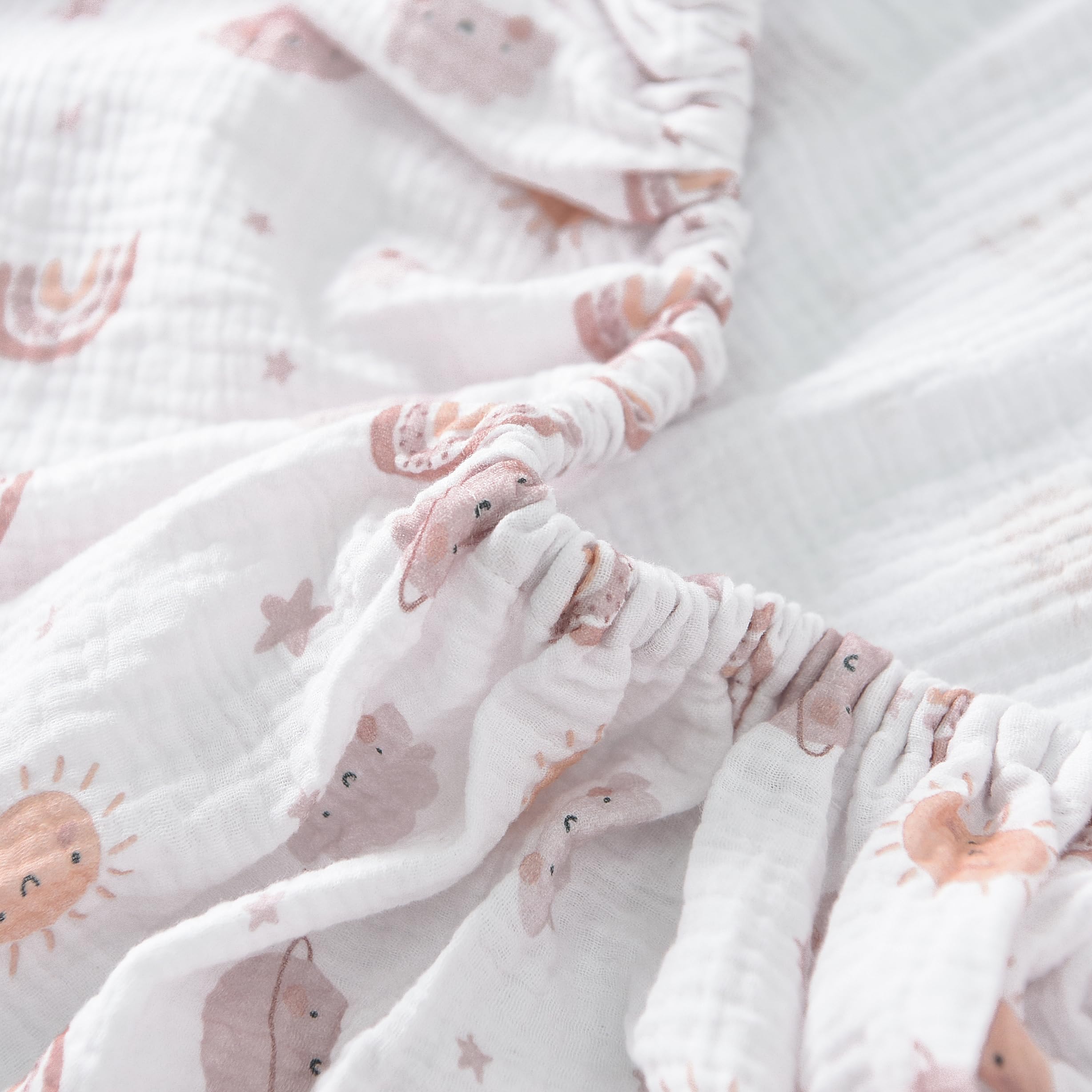 TADO MUSLIN two-pack stylish patterns for versatile nursery styling.