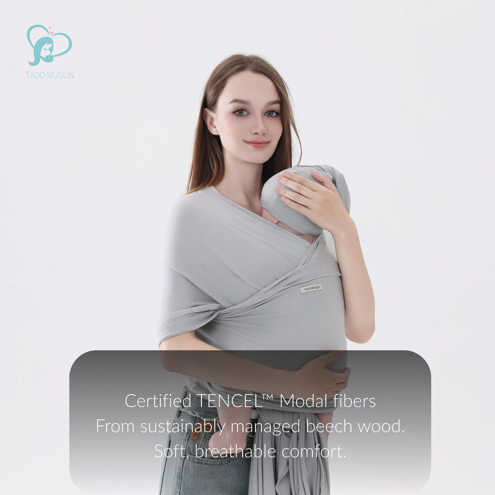 TADO MUSLIN ergonomic M-position support for comfortable carry.