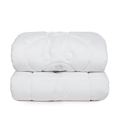 Tadpoles crib comforter 40x60 with square stitch pattern keeps fill secure.