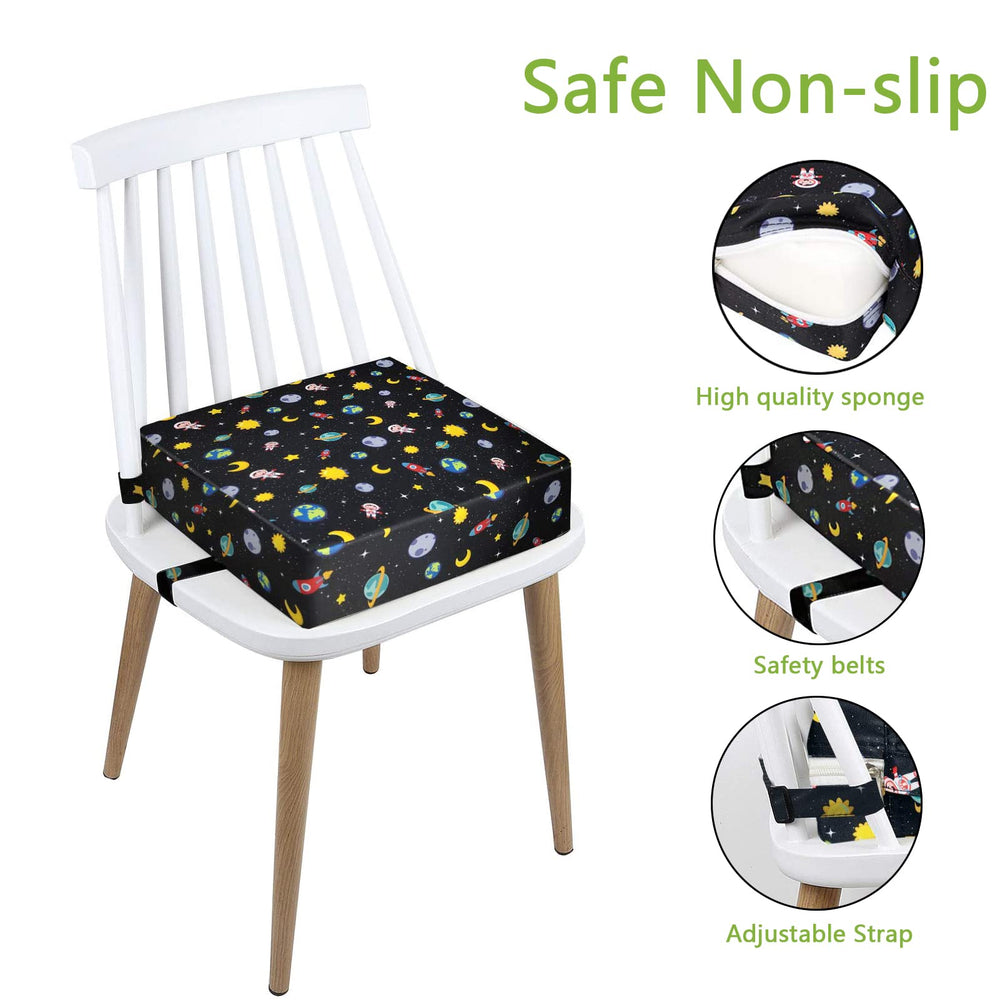Close-up of Taeku booster seat with two safety buckles securing it to a chair.