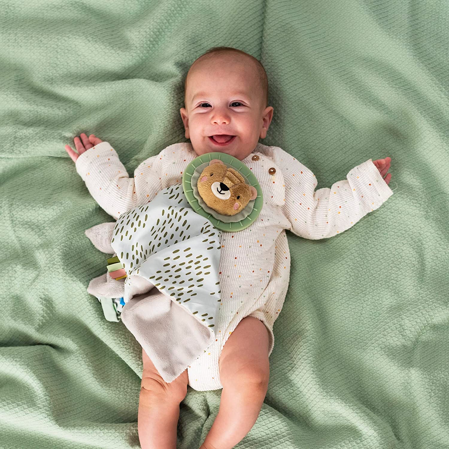 Close-up of Harry the lion mane teether for safe mouthing and sensory exploration.