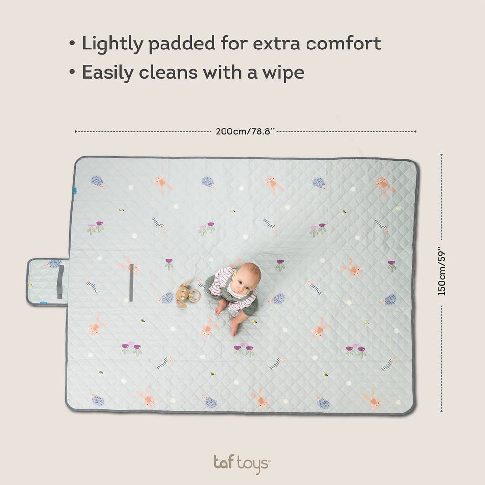 Taf Toys waterproof bottom blanket keeps the surface dry on damp ground