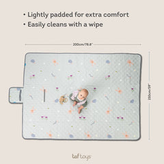 Taf Toys waterproof bottom blanket keeps the surface dry on damp ground