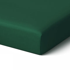 Tafts forest green bamboo crib sheet fits standard 28x52 cribs, offering cooling and soft comfort.