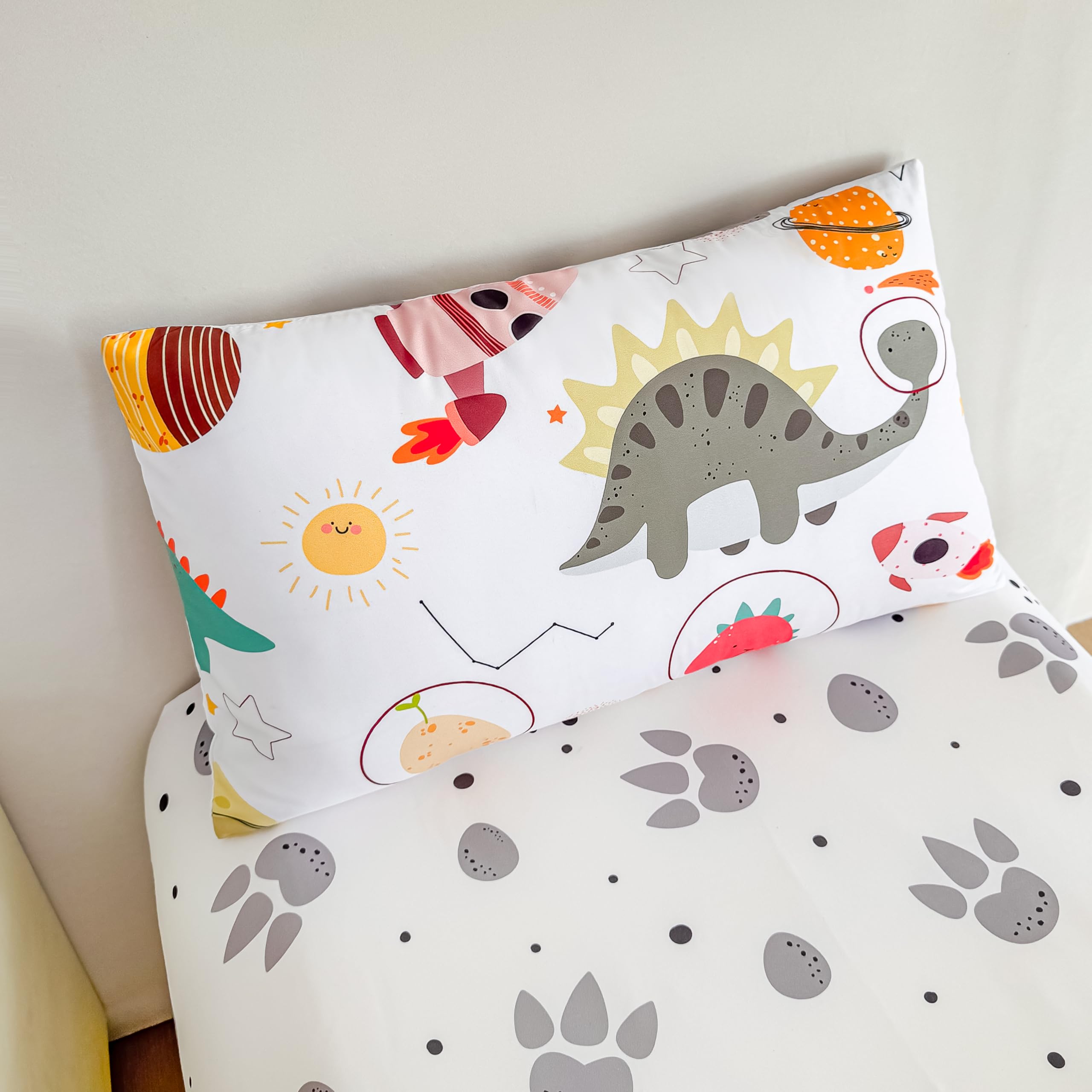 Tailor Shop dinosaur toddler bedding pattern showcasing vibrant design for kids