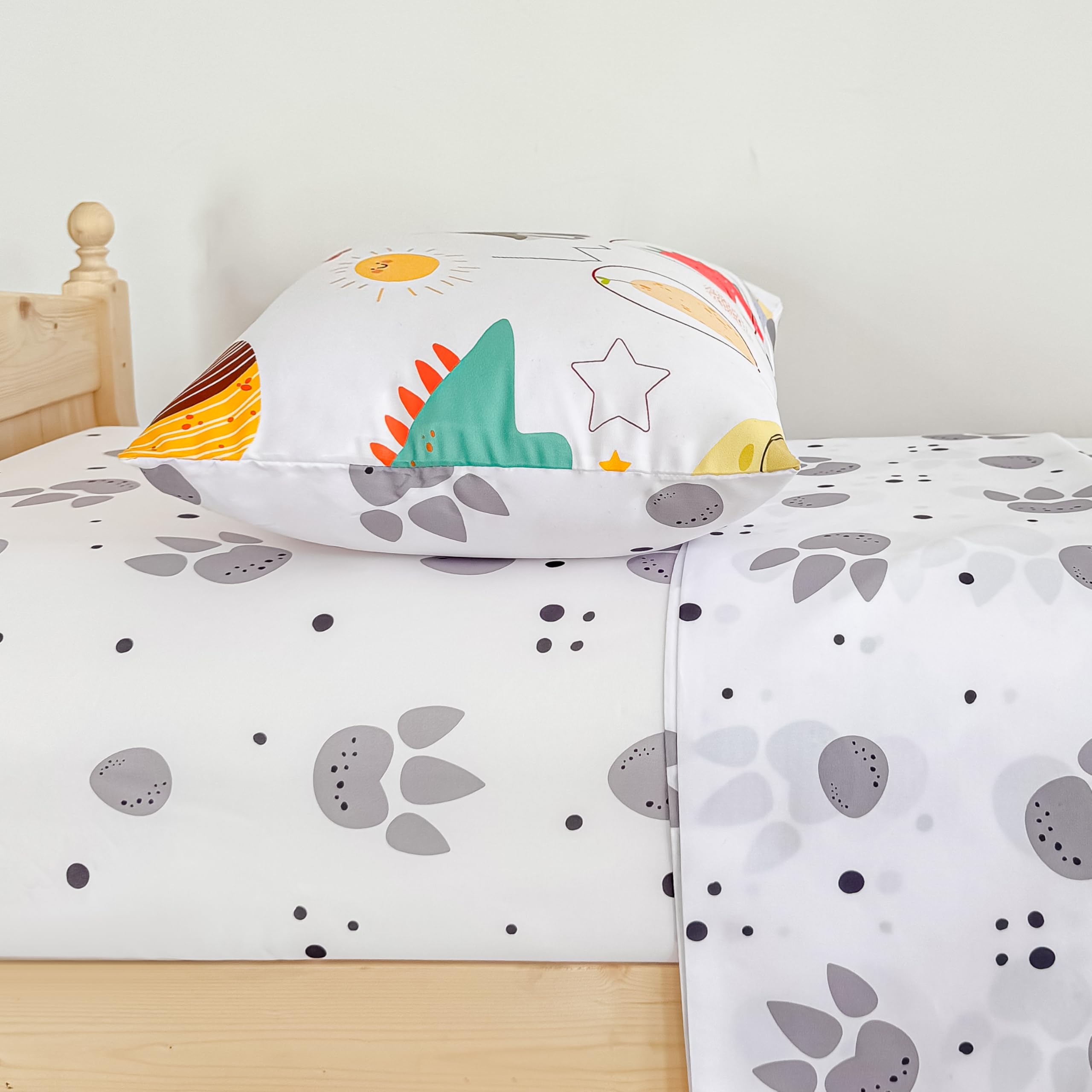 Tailor Shop dinosaur toddler bedding unpacked from vacuum packaging showing wrinkles