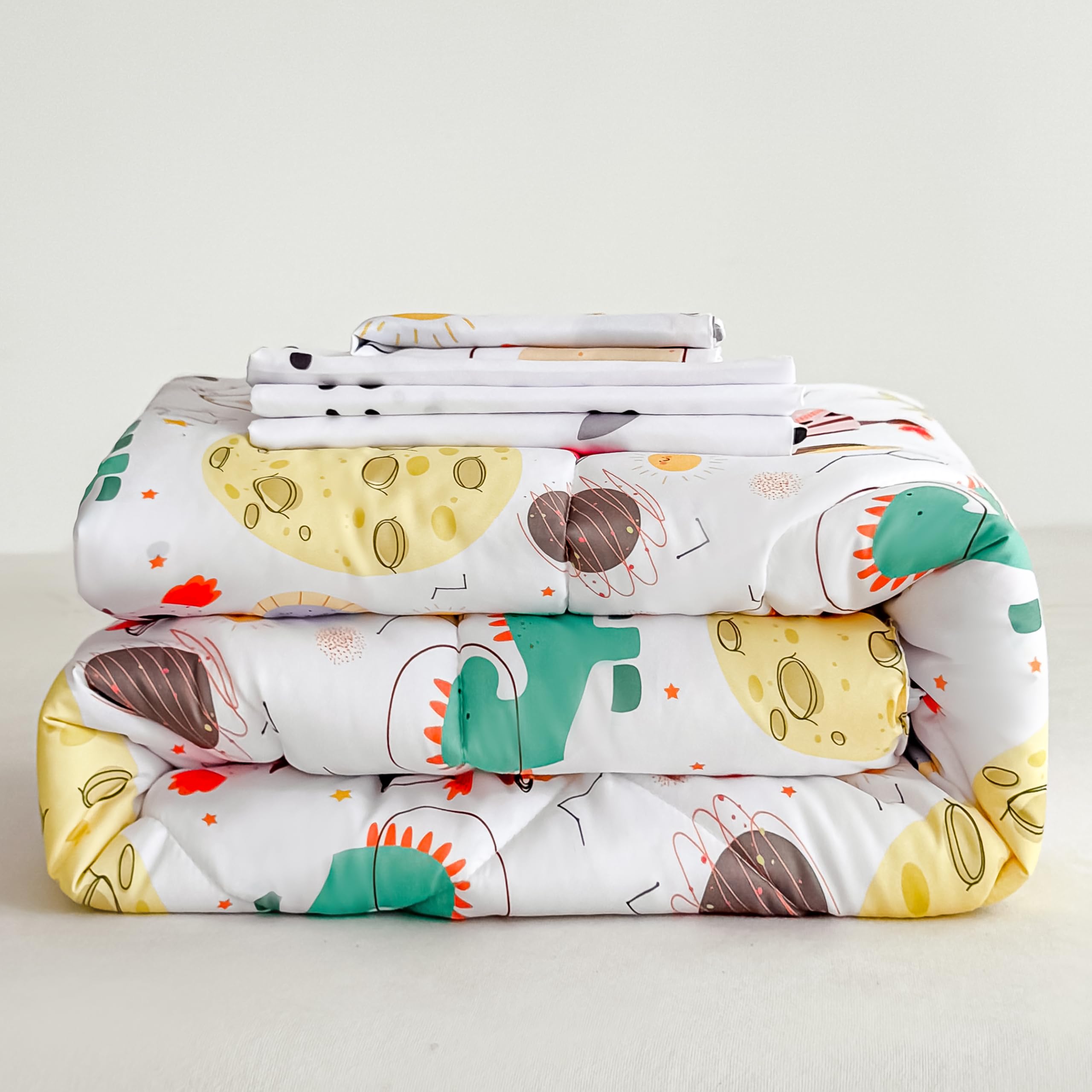 Tailor Shop dinosaur toddler fitted sheet with snug toddler bed fit
