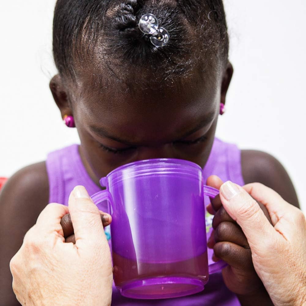 TalkTools ergonomic handles on purple cup designed for secure grasp.