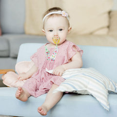 TAMHOO rainbow-pattern pacifier clip with adjustable strap offers versatile daily use.