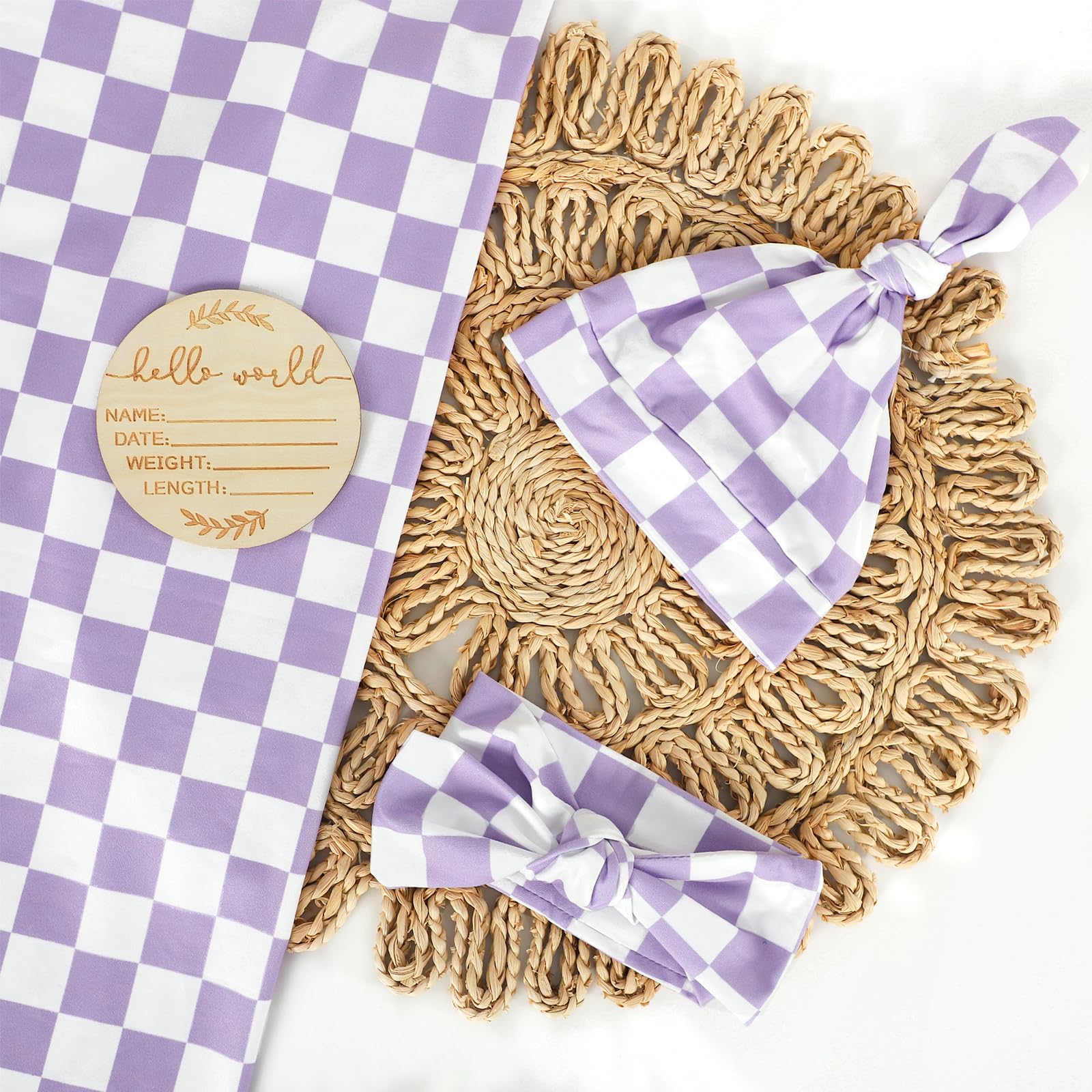 Tanofar matching purple headband complements the swaddle set.