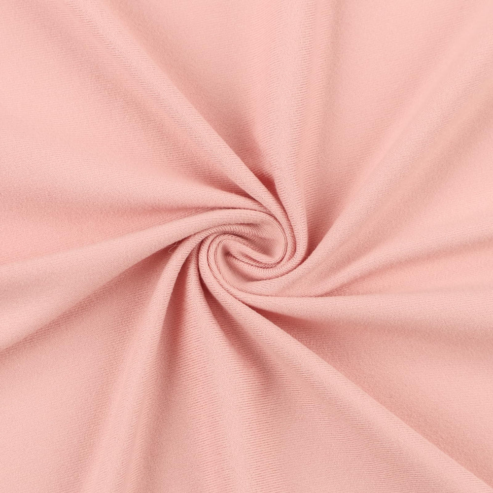 Tanofar newborn swaddle laid flat as a photo prop