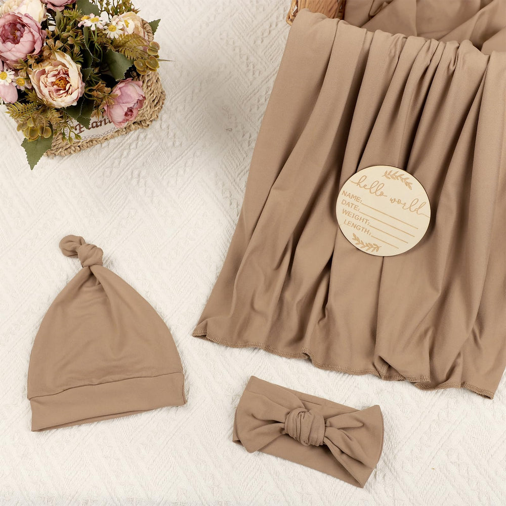 Tanofar swaddle used as nursing cover for discreet feeds.