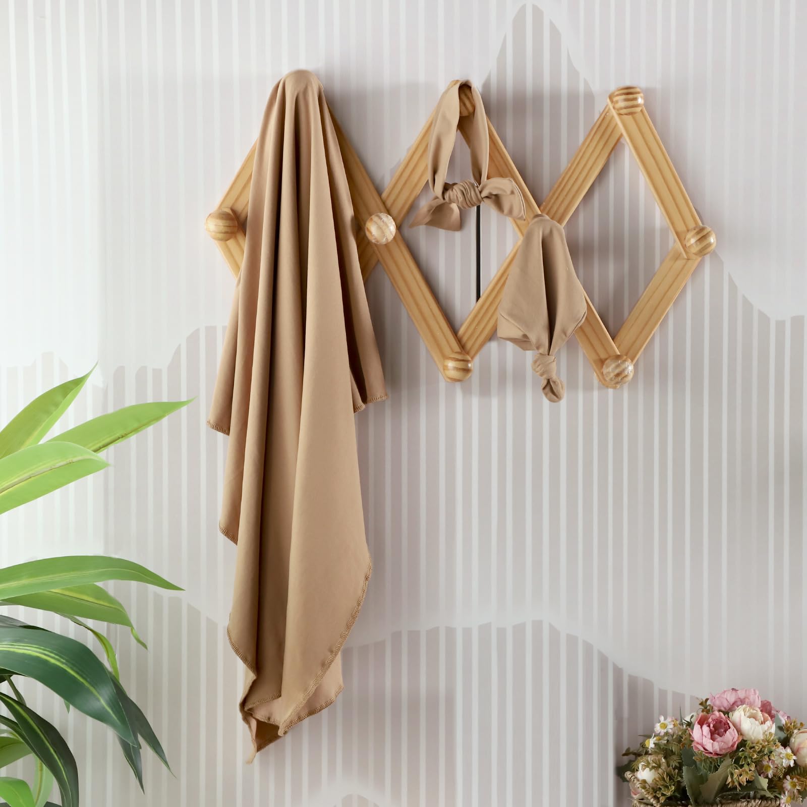 Tanofar brown swaddle doubles as a lightweight stroller blanket.