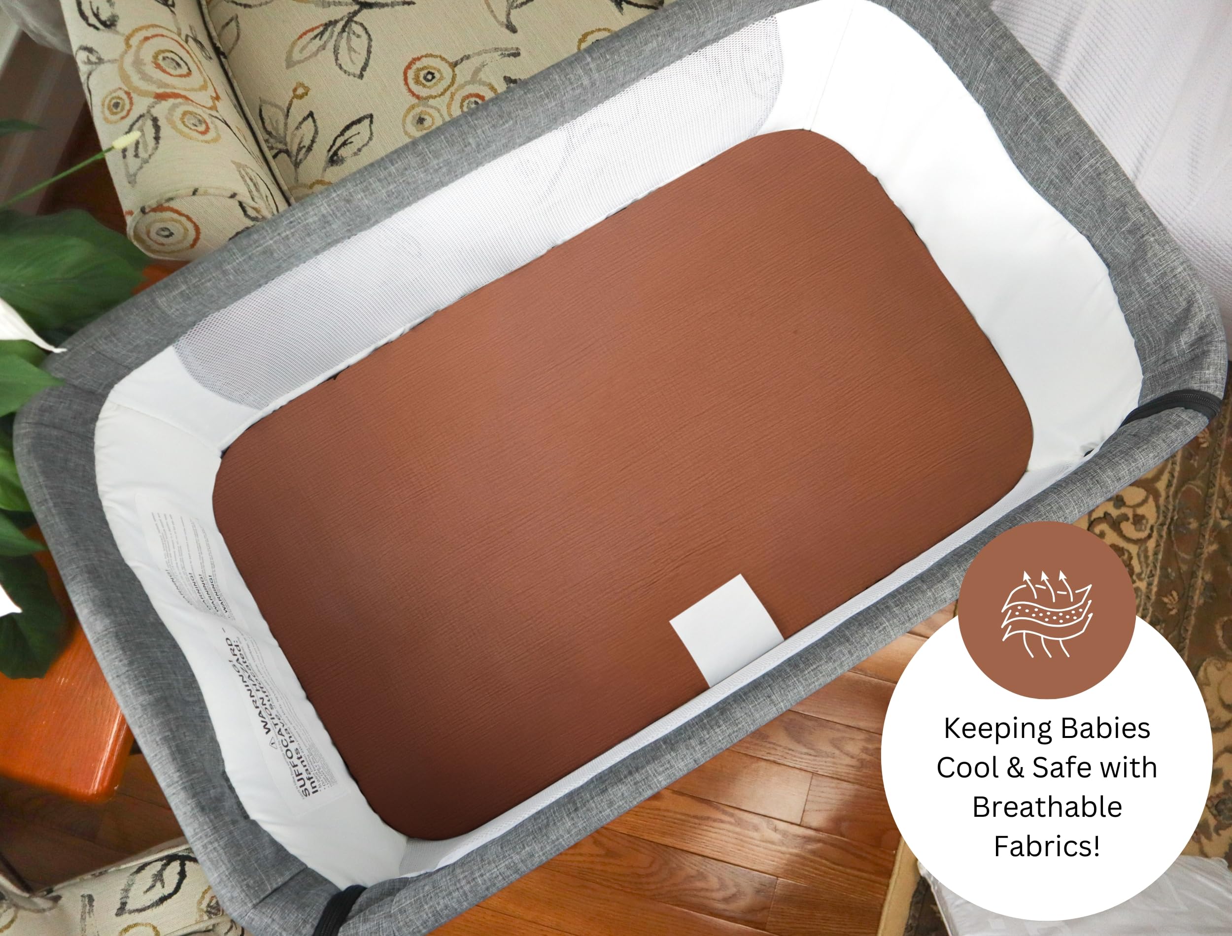 Baby sleeping on a Tansy Panda bassinet sheet demonstrates cozy breathable comfort.
