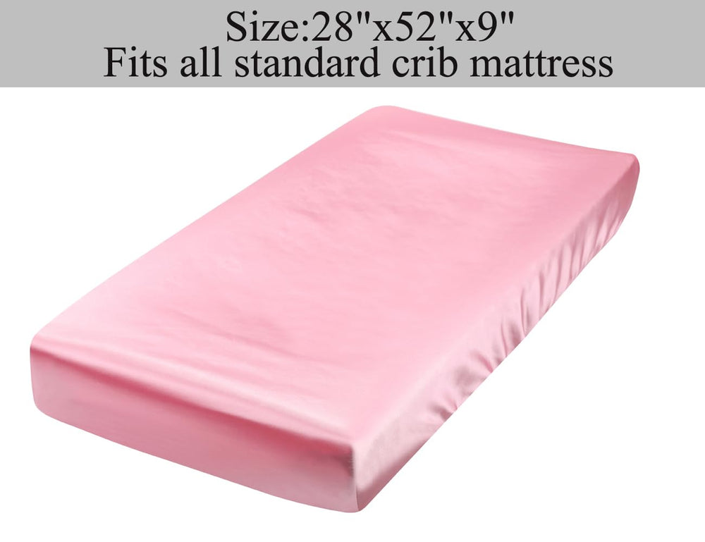 Tcmyyund machine-washable satin crib sheet in a laundry setting for easy care.