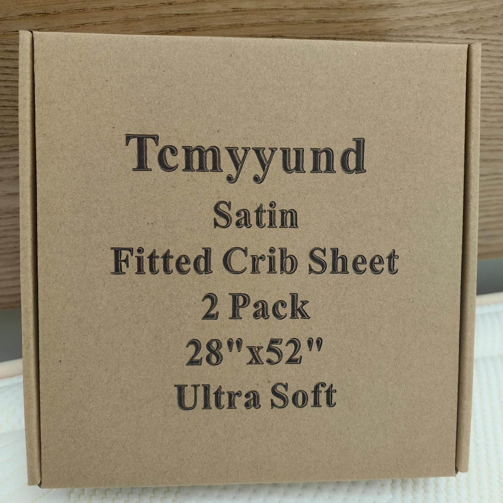Tcmyyund satin crib sheet 28x52 on standard crib and toddler mattress setup.