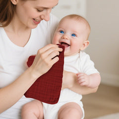 TDHD muslin burp cloths six-pack stack for convenient baby care.