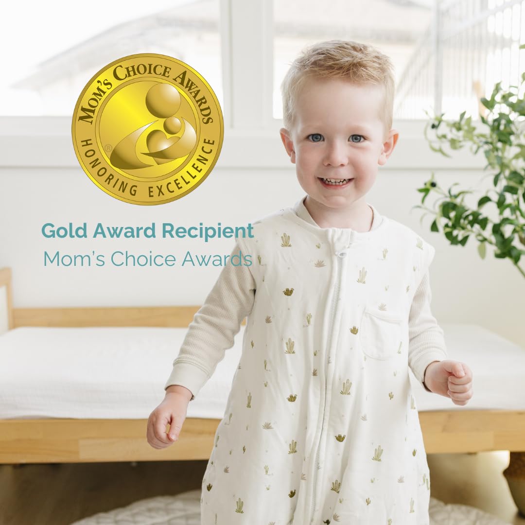Model wearing Tealbee Dreamsuit in size 12m-2T demonstrates relaxed fit.