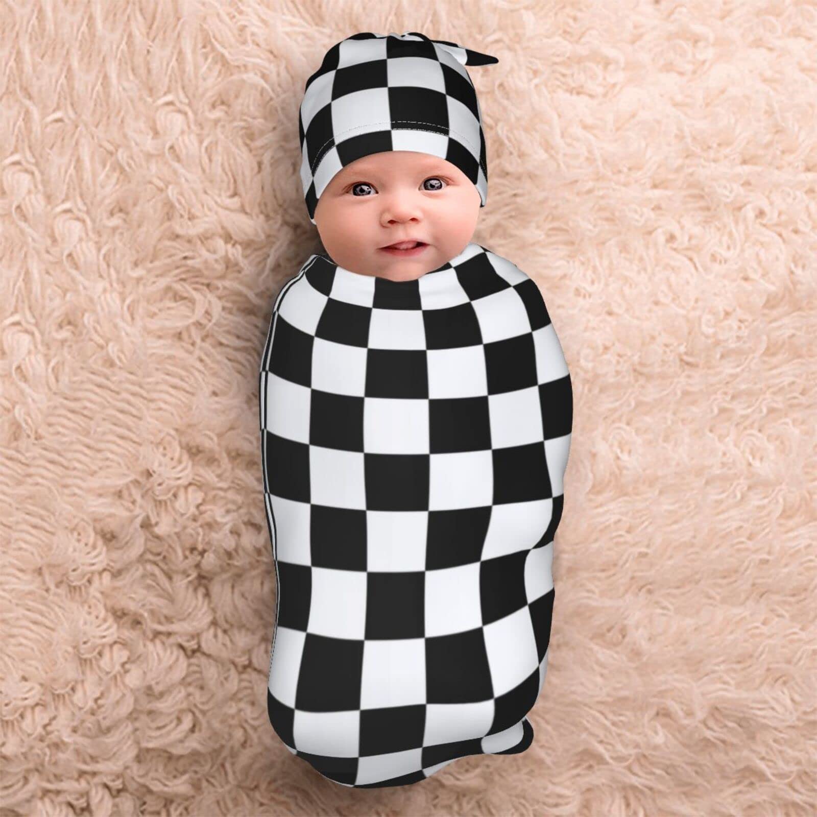 Tebjh newborn swaddle set opened with coordinated hat and blanket