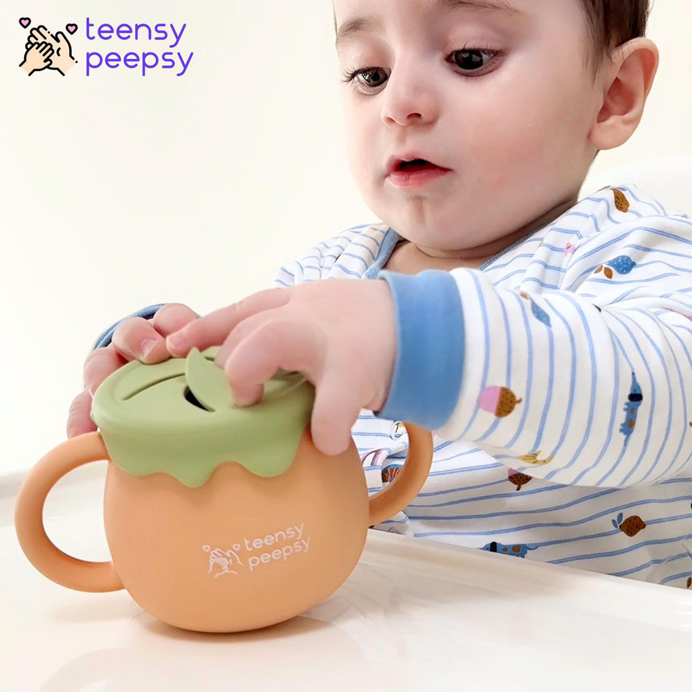 Teensy Peepsy silicone-straw enhances safe sipping for tiny mouths and gums.