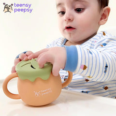 Teensy Peepsy silicone-straw enhances safe sipping for tiny mouths and gums.