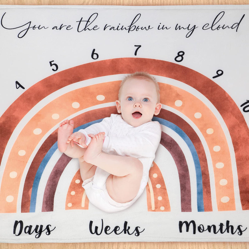 Tegeme Boho Rainbow milestone blanket supports a timeless baby portrait prop.