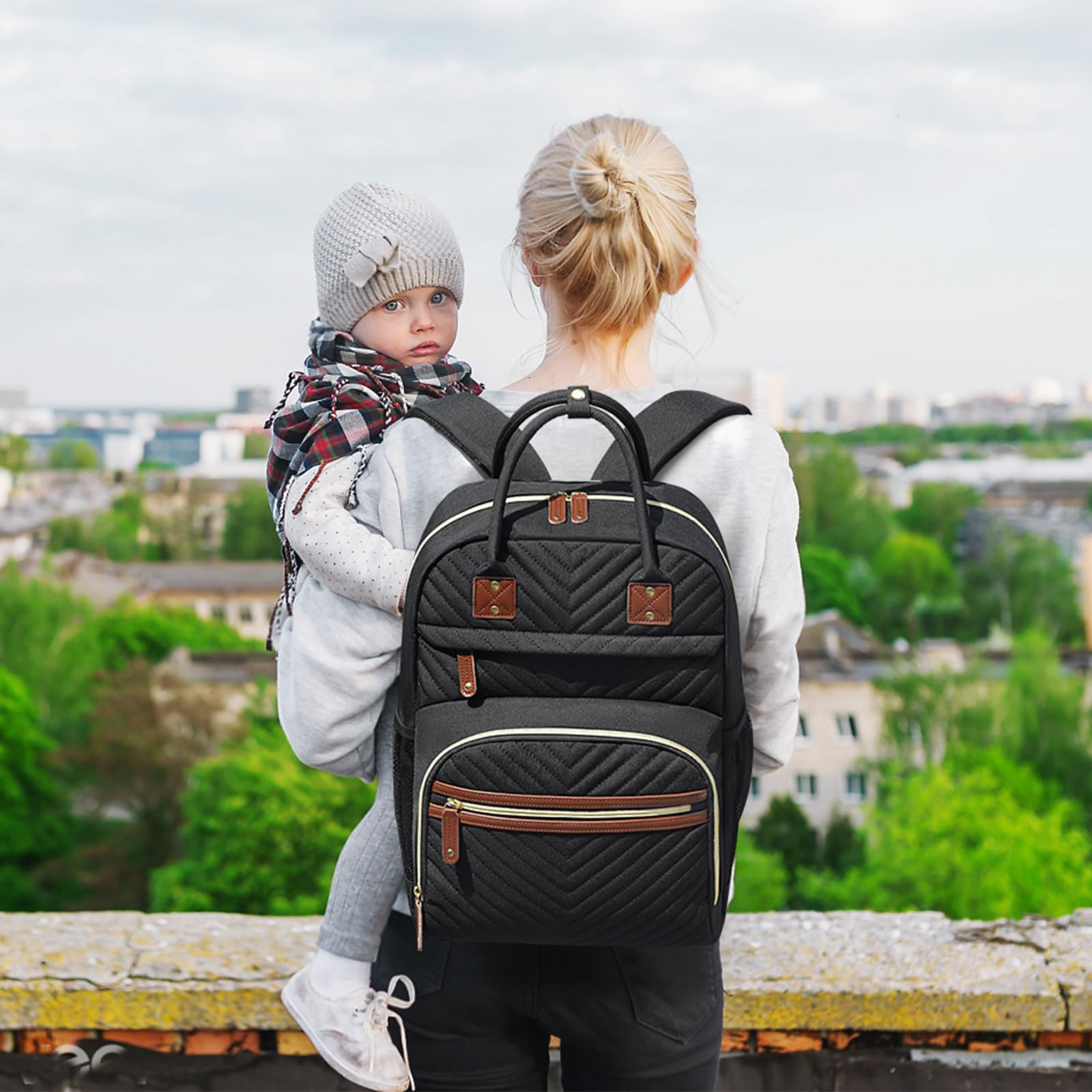 Detachable stroller straps on the Tenot diaper bag backpack for easy parenting transitions