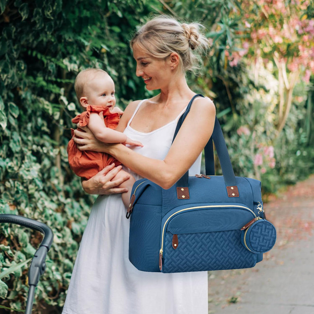 Tenot diaper bag tote uses waterproof fabric to keep items dry.