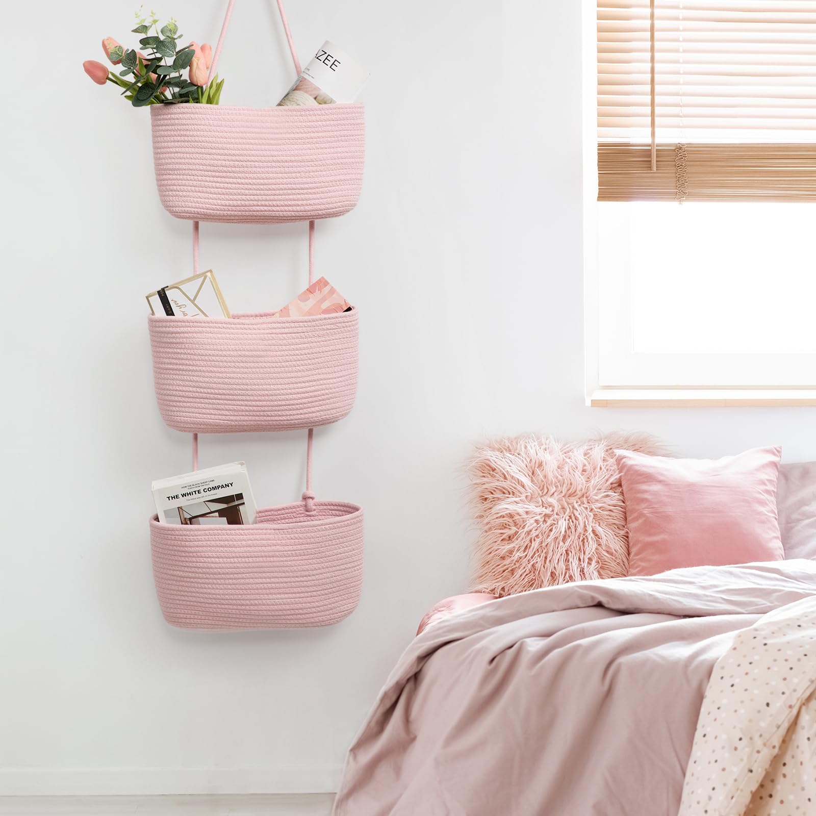 TeoKJ pink decorative hanging baskets brighten nursery decor.