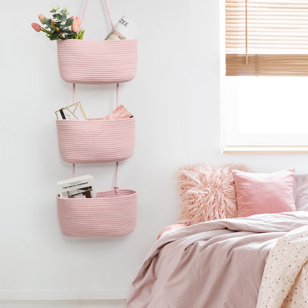 TeoKJ pink decorative hanging baskets brighten nursery decor.