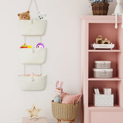 TeoKJ hanging baskets in a dining room add decorative storage in white.