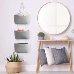 TeoKJ over-the-door baskets used for cosmetics and small tools in a tidy setup.