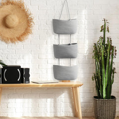 TeoKJ wall-mounted setup with gray woven baskets demonstrates space-saving kitchen organization.