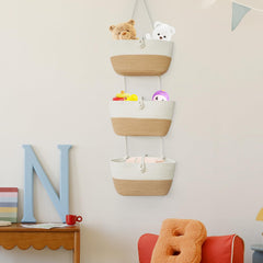 TeoKJ pearl button strap detail adds decorative touch while organizing