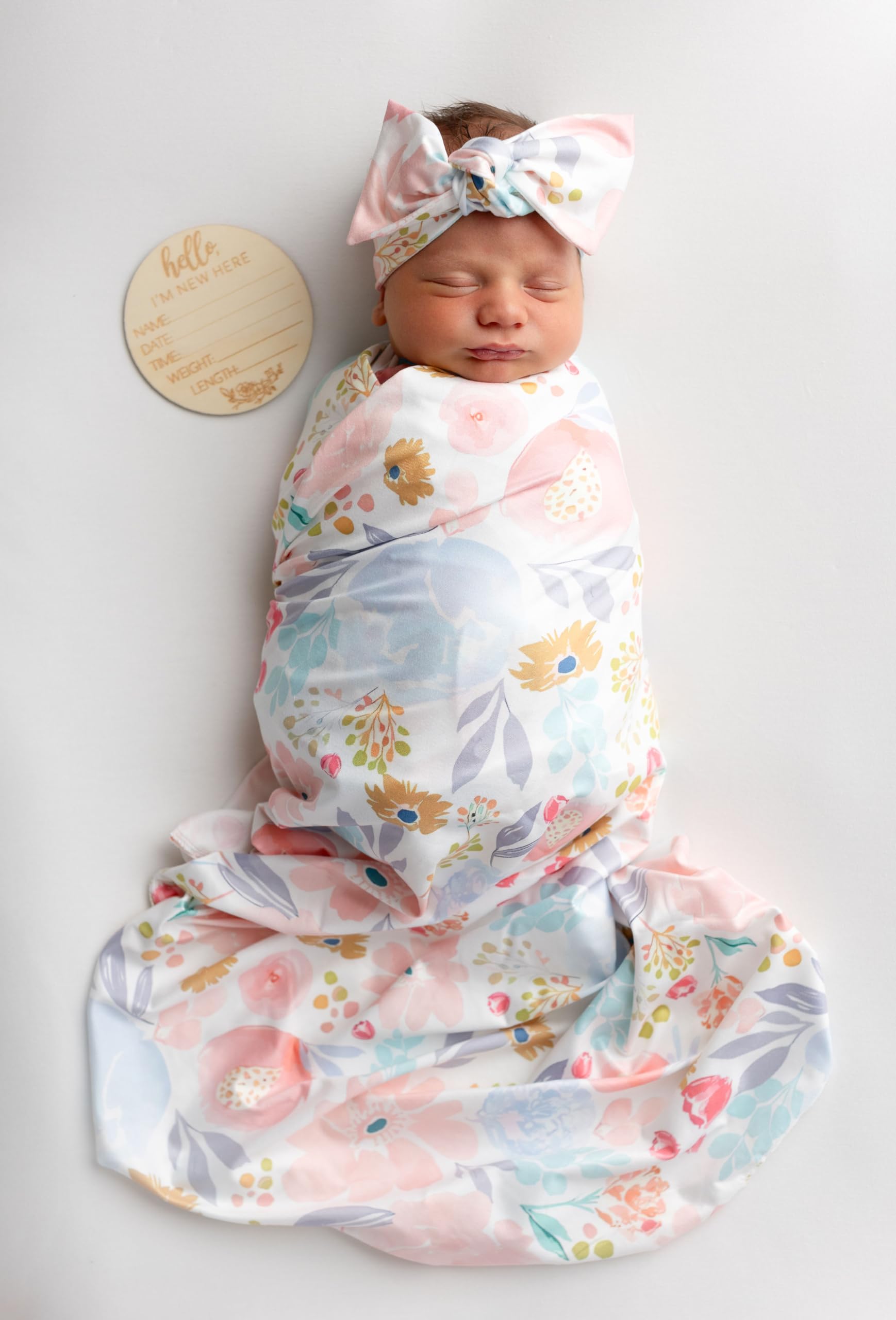 Terriboo newborn floral wrap blanket for cozy swaddling and photography.