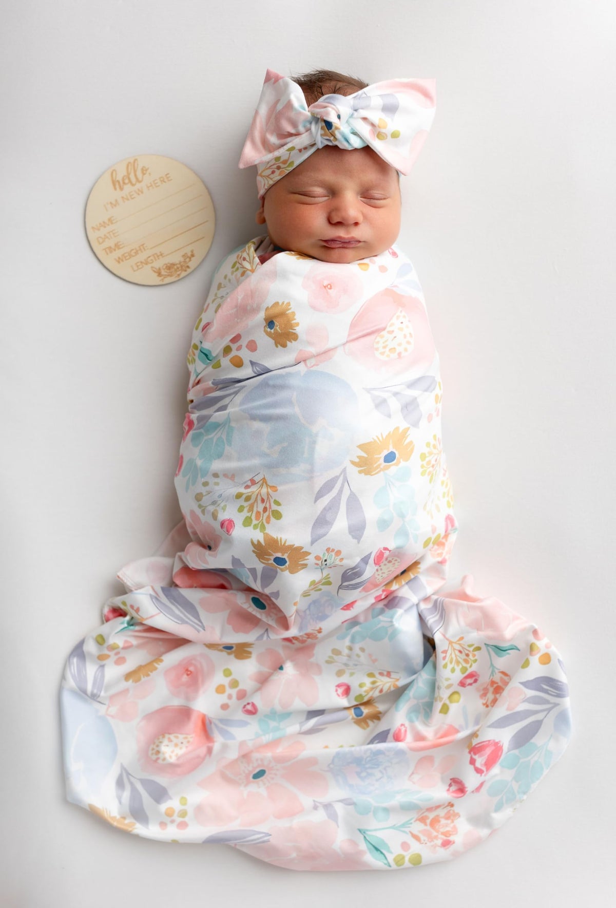 Terriboo newborn floral wrap blanket for cozy swaddling and photography.