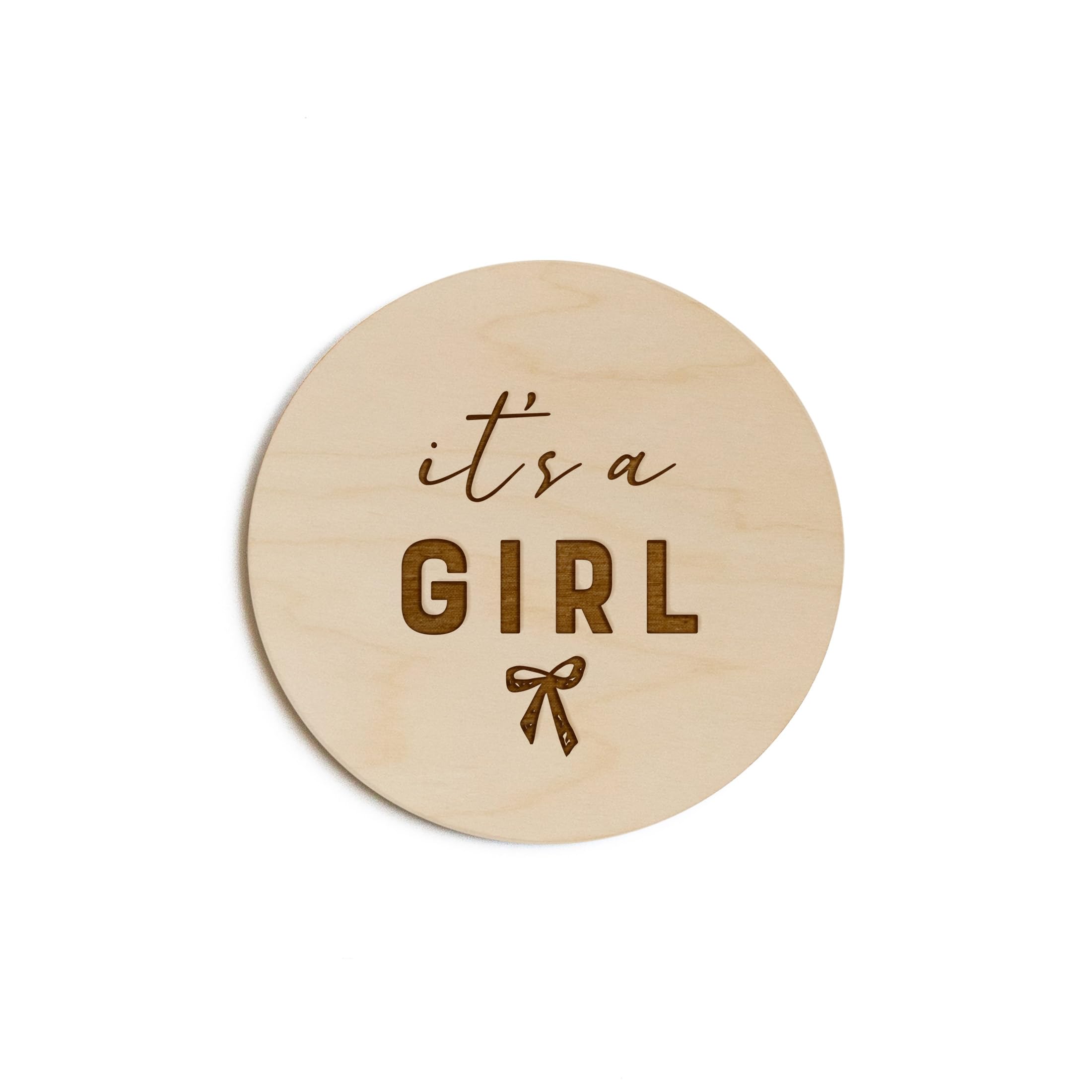 The Cotton & Canvas Co. It's a Girl with Bow disc, engraved for nursery keepsake.