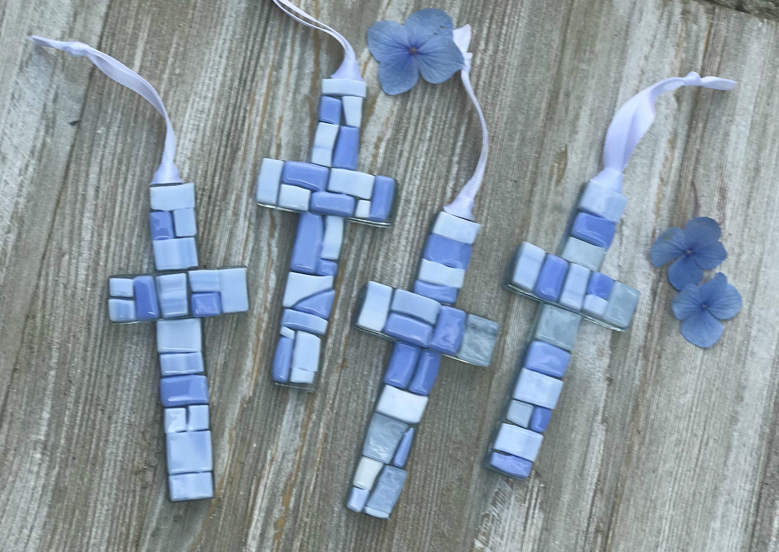 The Grandparent Gift Co. white satin ribbon used to hang the cross for display.