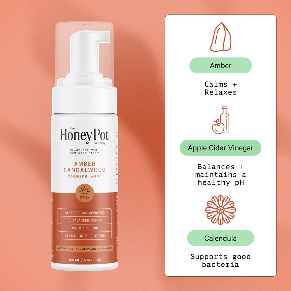 The Honey Pot Amber Sandalwood wash foam close-up showing rich, gentle lather.