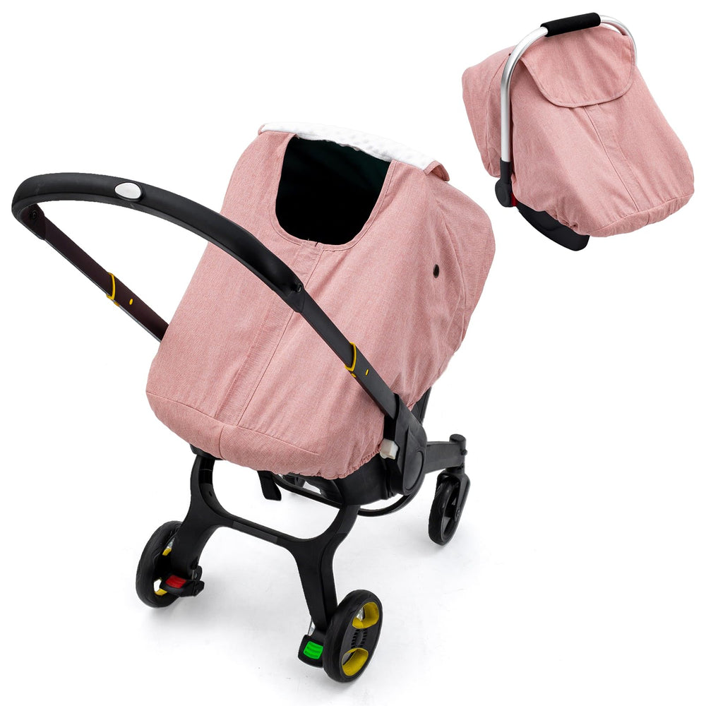 The Kenkyo car seat cover's waterproof exterior shields your baby from rain on strolls.