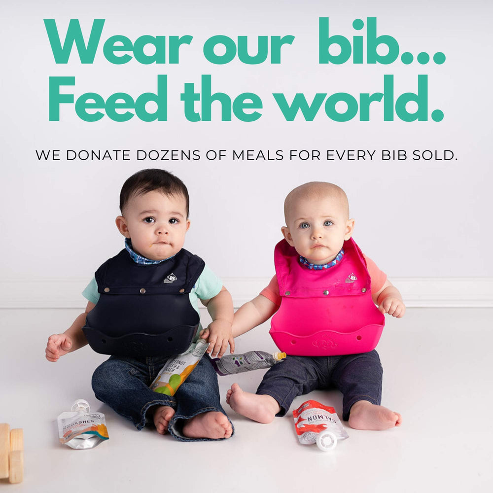 The Little Monkey Company cute design bib adds charm to mealtimes and crafts.