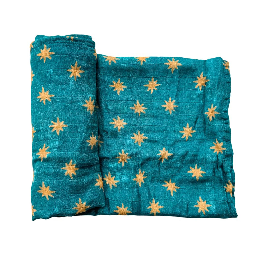 The Little Rose Shop Marys Mantle swaddle with rosary dots supports gentle soothing.
