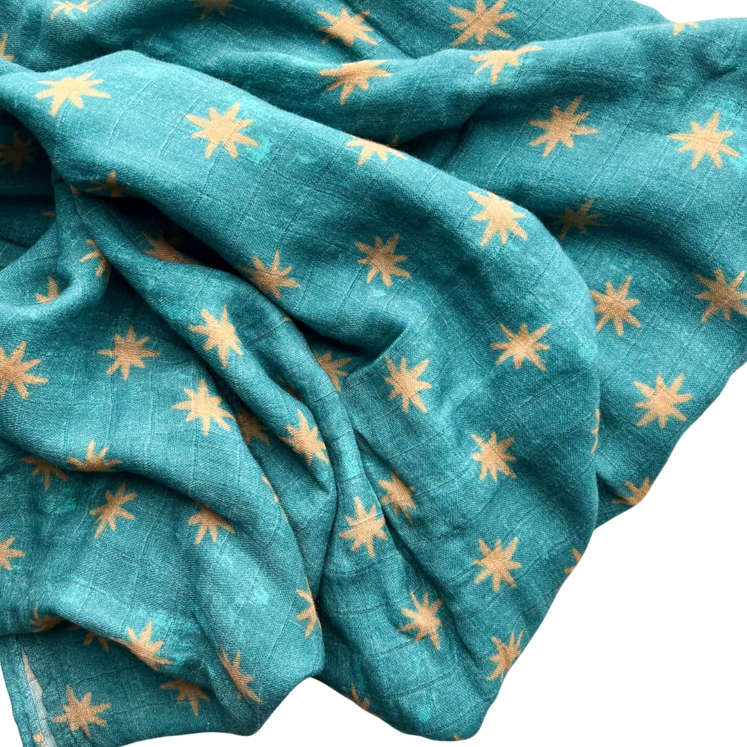 The Little Rose Shop Our Lady of Guadalupe swaddle with Star of the Sea design offers newborn comfort.